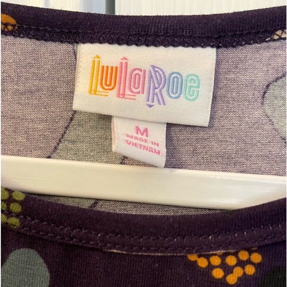 NWT LuLaRoe IRMA HI-LOW SHORT SLEEVE TUNIC TOP. Blue/Gold Multi-Color. Size M. - Picture 4 of 5